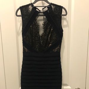 Navy and black lace body con dress. Never worn